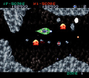 Super Nova for Super NES - Pick up the red orb to increase your firepower.
