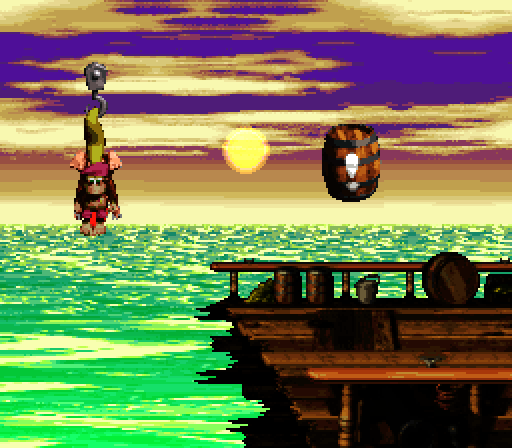 Donkey Kong Country 2: Diddy's Kong Quest Super NES Screenshot: Hang on the hooks to help cross large gaps.