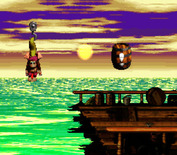 Donkey Kong Country 2: Diddy's Kong Quest for Super NES - Hang on the hooks to help cross large gaps.