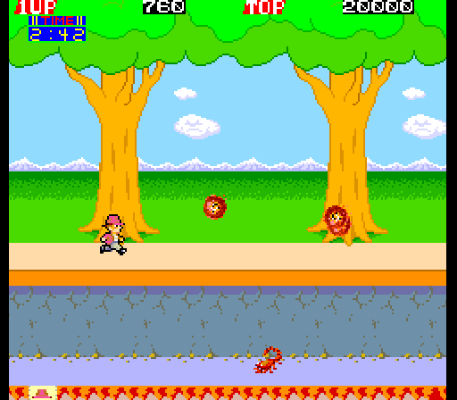 Pitfall II: Lost Caverns Arcade Screenshot: Duck under the fire bouncing towards you!