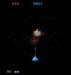 Mad Planets for Arcade - Firing at an incoming planet.