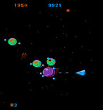 Mad Planets for Arcade - Firing at a purple planet...