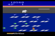 Frostbite for Atari 2600 - Collect the green fish for a bonus, but avoid all of the other creatures.