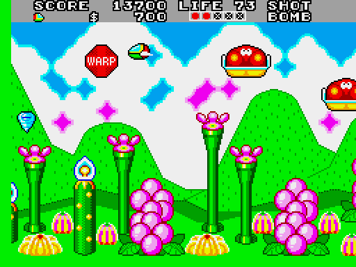 Fantasy Zone II: The Tears of Opa-Opa Arcade Screenshot: Enter the warp to move on to a different area.