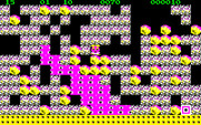 Boulder Dash for PC-8800 Series - The purple slime will slowly expand in the cave...