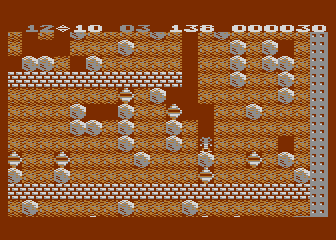 Boulder Dash Atari 8-bit Screenshot: Collecting diamonds...