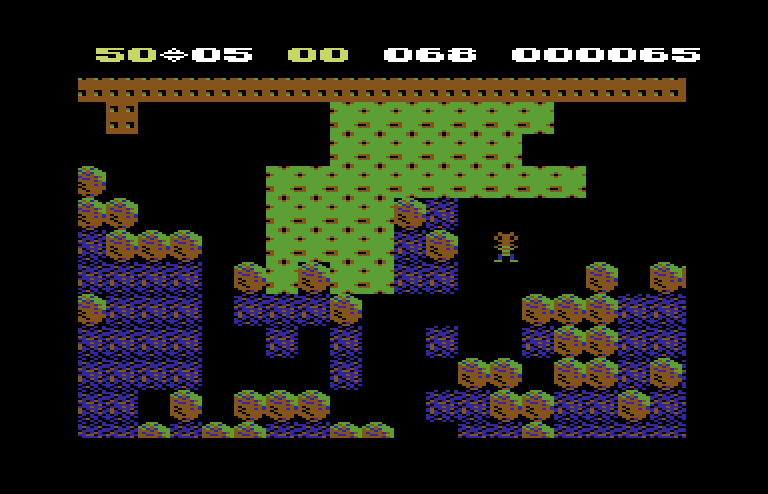 Boulder Dash Commodore 64 Screenshot: The slime has gotten larger...