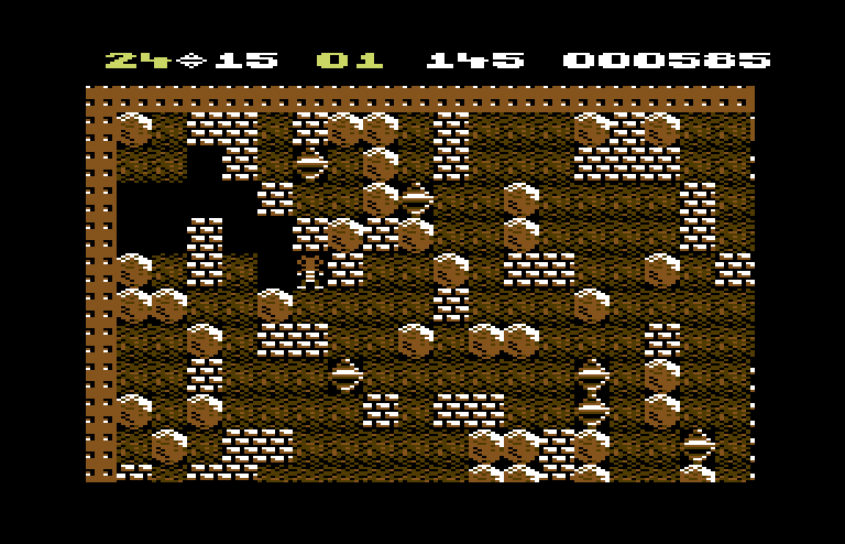 Boulder Dash Commodore 64 Screenshot: Numerous boulders make this cave challenging.