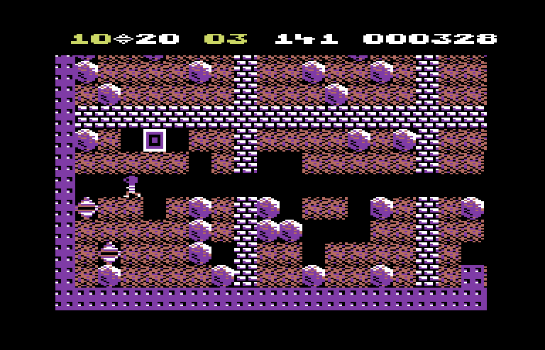 Boulder Dash Commodore 64 Screenshot: Avoid those boxes...they're deadly!