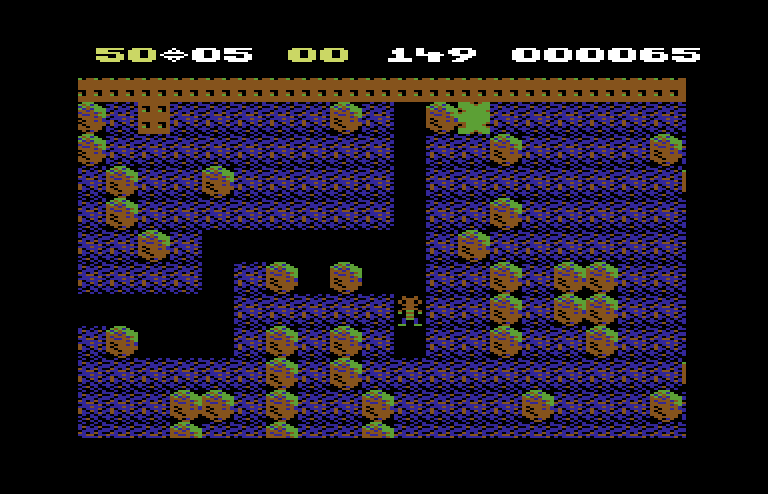Boulder Dash Commodore 64 Screenshot: That patch of green slime will continue to grow...