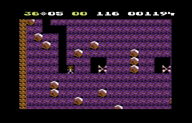 Boulder Dash Commodore 64 Screenshot: Crush these butterflies with boulders to turn them into diamonds.