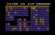 Boulder Dash for Commodore 64 - That patch of green slime will continue to grow...