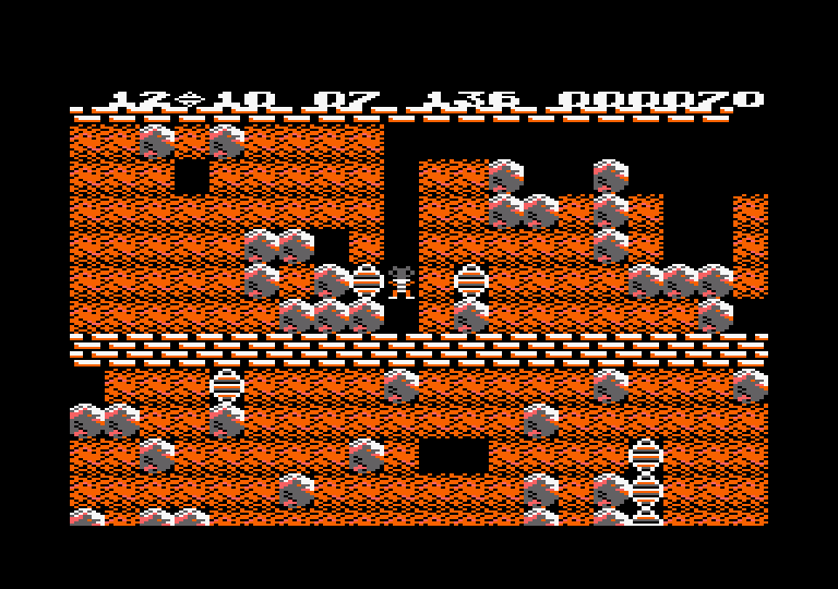 Boulder Dash Amstrad CPC Screenshot: Collecting diamonds...