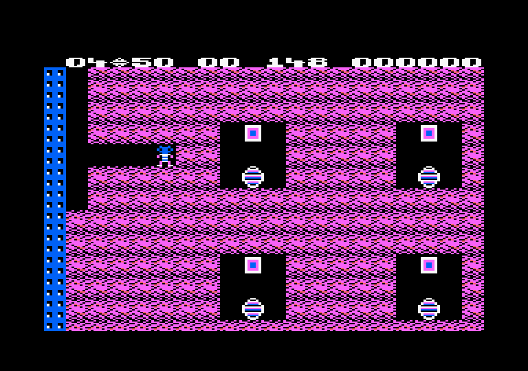 Boulder Dash Amstrad CPC Screenshot: Those boxes move fast and are deadly...