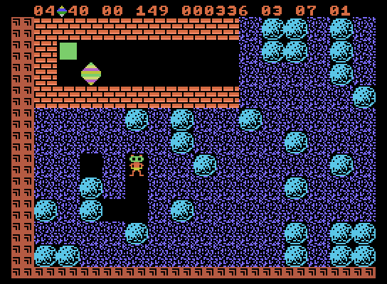 Boulder Dash ColecoVision Screenshot: More diamonds and boulders...crush the boxes for a bonus if you can!