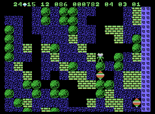 Boulder Dash ColecoVision Screenshot: There are a lot of diamonds to collect, but numerous boulders in the way!