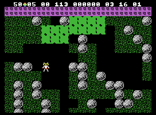 Boulder Dash ColecoVision Screenshot: The slime will slowly expand...try to contain it with boulders.