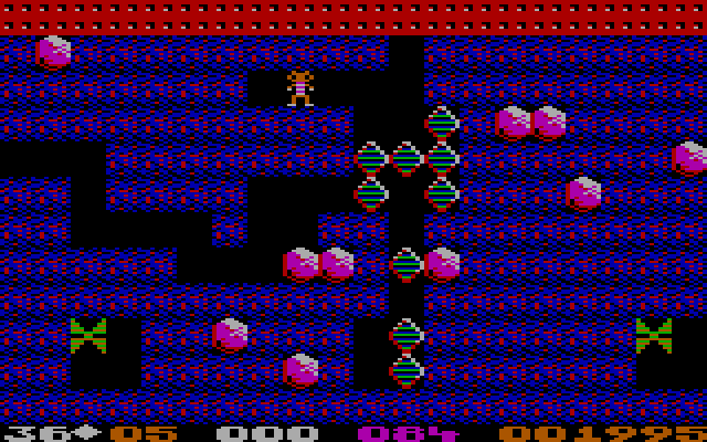 Boulder Dash IBM PC/Compatibles Screenshot: The butterflies need to be crushed with boulders in order for them to turn into diamonds.