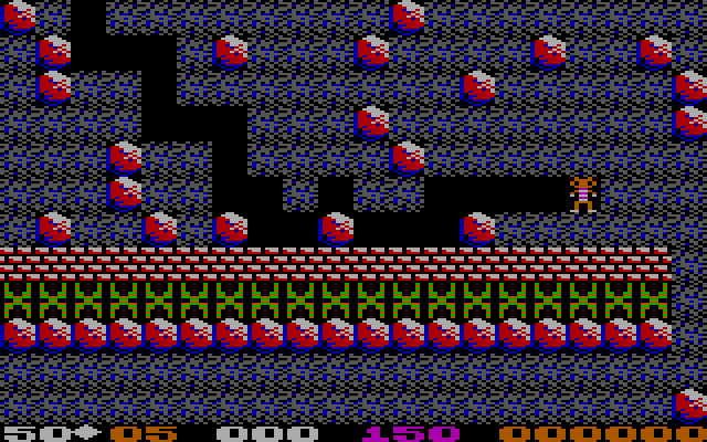 Boulder Dash IBM PC/Compatibles Screenshot: An entire row of those butterflies; looks dangerous.