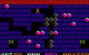 Boulder Dash for IBM PC/Compatibles - The butterflies need to be crushed with boulders in order for them to turn into diamonds.