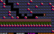 Boulder Dash for IBM PC/Compatibles - An entire row of those butterflies; looks dangerous.
