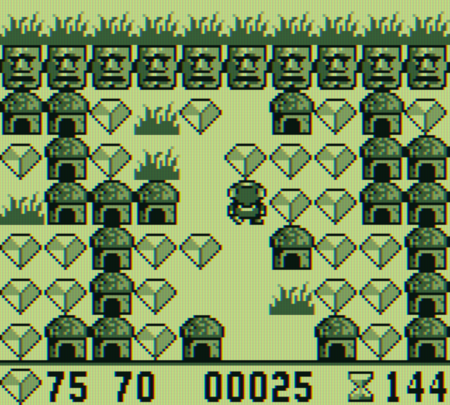 Boulder Dash Game Boy Screenshot: Things that will crush you are everywhere!