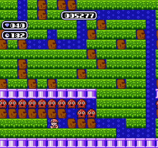 Boulder Dash NES / Famicom Screenshot: Running beneath boulders in order to release some critters!