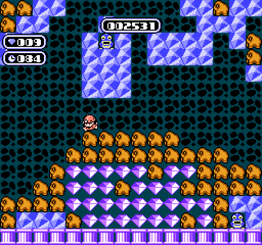 Boulder Dash NES / Famicom Screenshot: Suffocate slime to turn it into diamonds!