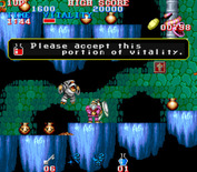 Black Tiger for Arcade - Sometimes you'll receive items for saving a person.