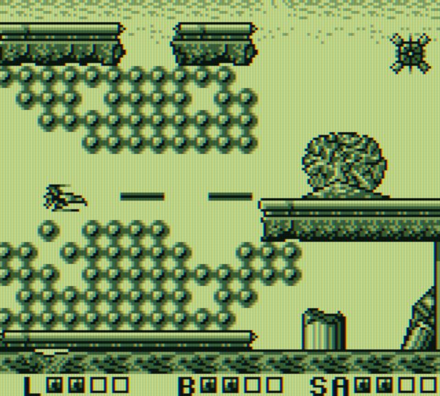 Sagaia Game Boy Screenshot: Shooting my way through some obstacles.