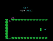 Cavern Quest for TI-99/4A - Final stage; shoot the creatures before they reach the key!