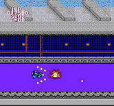 BreakThru for NES / Famicom - Shooting enemy tanks.
