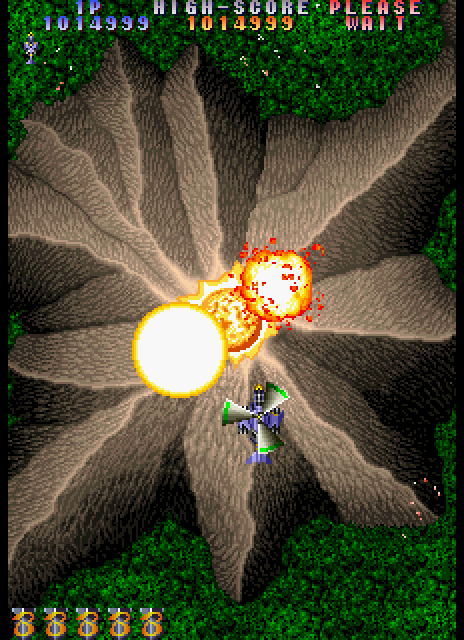 Twin Cobra II Arcade Screenshot: A volcano explodes!