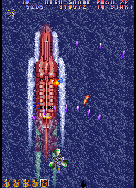 Twin Cobra II Arcade Screenshot: An enemy sub appears...