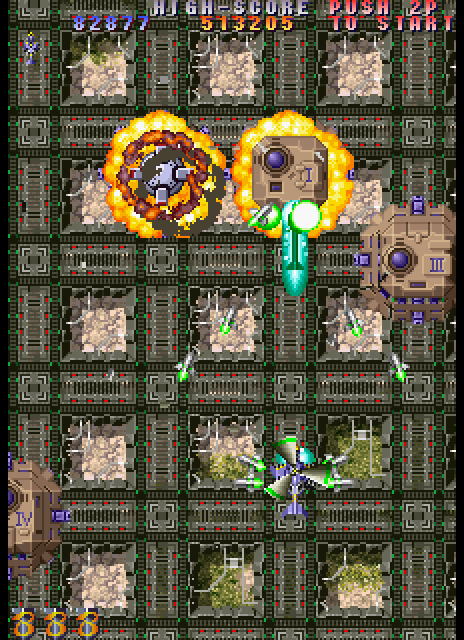 Twin Cobra II Arcade Screenshot: Blowing up some ground based targets...