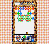 Bust-A-Move 4 for Game Boy Color - Shooting bubbles into place on the second round...