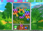 Bust-A-Move 3 for Arcade - Round 3; the bubbles get lower and lower!