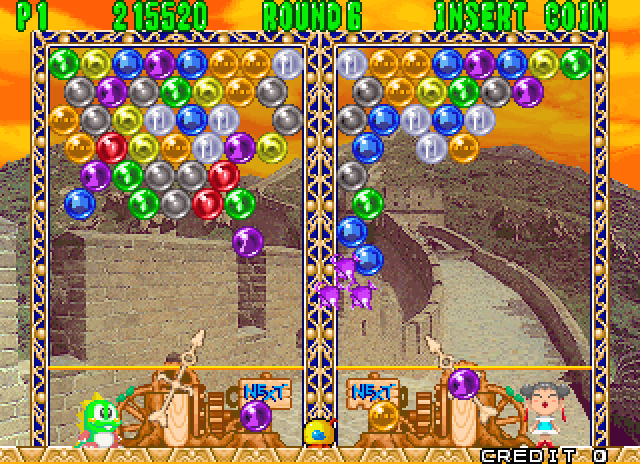 Bust-A-Move Again Arcade Screenshot: Blasting a bubble into place...