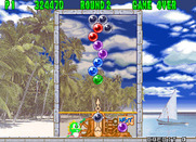 Bust-A-Move Again for Arcade - A carefully placed shot can end this puzzle quickly...
