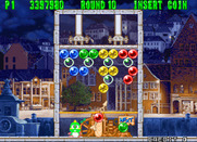Bust-A-Move Again for Arcade - Puzzle pieces are pushed down...don't let them hit the bottom!