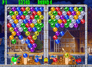 Bust-A-Move Again for Arcade - The bubbles have almost reach the bottom of the screen...