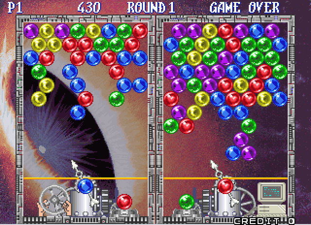 Bust-A-Move Again Arcade Screenshot: The board fills up...player 1 is slightly ahead...!