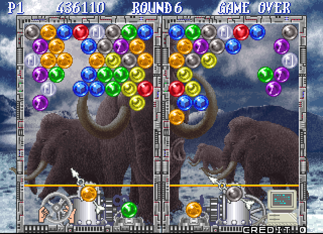 Bust-A-Move Again Arcade Screenshot: Blast the bubbles into place...