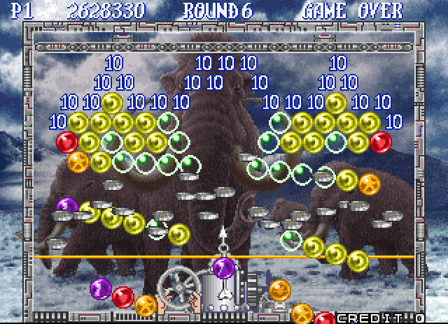 Bust-A-Move Again Arcade Screenshot: The bubbles fall down after hitting the top row...