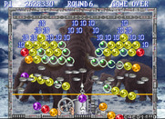Bust-A-Move Again for Arcade - The bubbles fall down after hitting the top row...