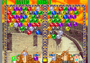 Bust-A-Move Again for Arcade - The battle continues on round 6.
