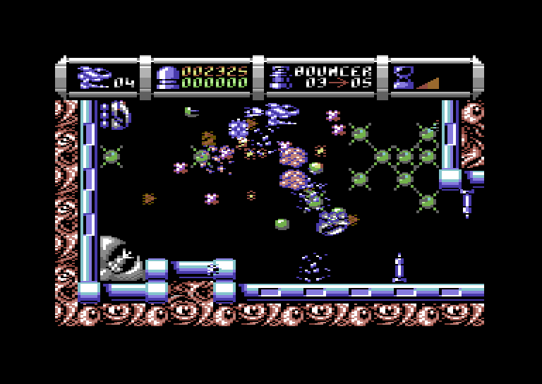 Cybernoid II: The Revenge Commodore 64 Screenshot: It's chaos! shooting myself a path while various opponents attack.