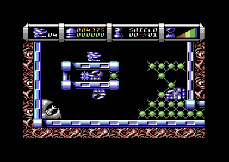 Cybernoid II: The Revenge Commodore 64 Screenshot: Another screen where you need to clear yourself a path.
