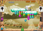 Pop'n Pop for Arcade - Boss battle; that thing on the clouds pounds them lower towards the ground...