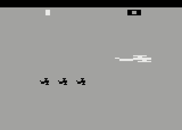 Combat Atari 2600 Screenshot: Three small planes chasing the large one...